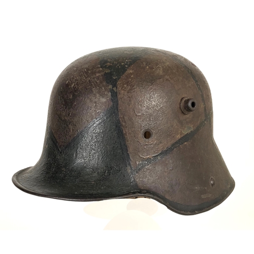 389 - Imperial German WW1 Camouflage Steel Helmet.  A good and scarce example with camouflaged painted fin... 