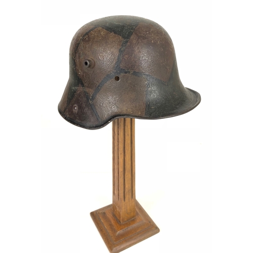 389 - Imperial German WW1 Camouflage Steel Helmet.  A good and scarce example with camouflaged painted fin... 