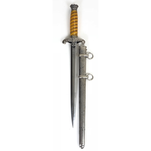 452 - German Third Reich Army Officer's Dagger.  Good example circa 1935-45 with amber spiral celluloid gr... 