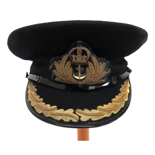 171 - Post 1901 Royal Navy Commander Service Dress Cap
black crown and body.  Black peak with gilt wi... 