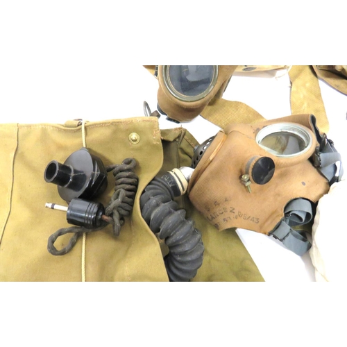 185 - Four Various WW2 Respirators
consisting WW2 hose example dated 