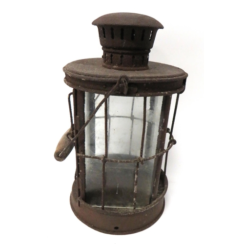 194 - WW1 Dated 1916 Trench Lantern
pressed tin body with frame covering glazing.  Top opening housin... 