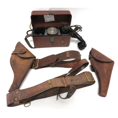 195 - Small Selection Of Equipment
consisting two brown leather Webley revolver holsters.  One with m... 