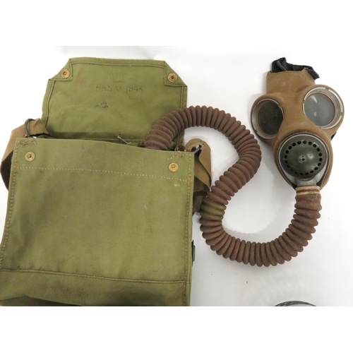 225 - WW2 Special Troops Hose Respirator
fabric covered face mask.  External, long respirator hose. &... 