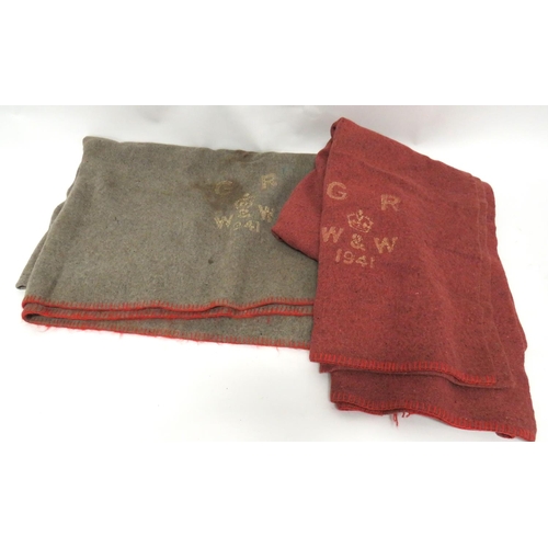 229 - Two 1941 Dated Military Issue Blankets
consisting a grey woollen blanket and a light red woollen bla... 