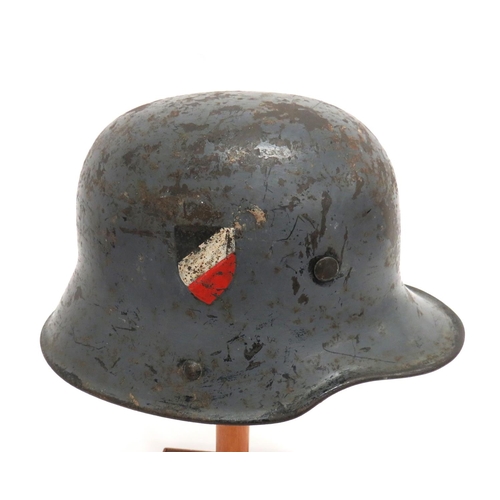 292 - WW1 Imperial German M1916 Steel Helmet Later Reissued
grey, repainted crown with lower rolled brim. ... 