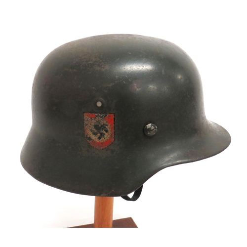 293 - WW2 Third Reich German Police M35 Steel Helmet
grey green painted crown with lower rolled rim.  ... 