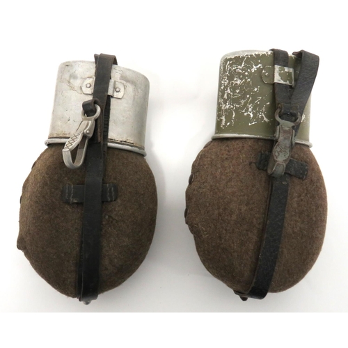 294 - Two WW2 Third Reich German Waterbottles And Cups
brown felt covered, alloy waterbottle.  Intern... 