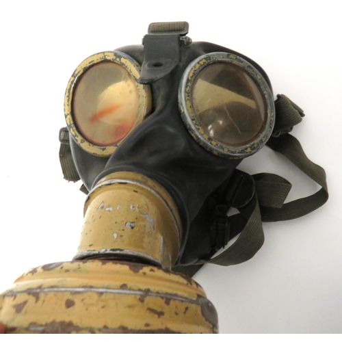 295 - WW2 Third Reich German Gas Respirator
black rubber face mask with circular eye lenses.  Elastic... 