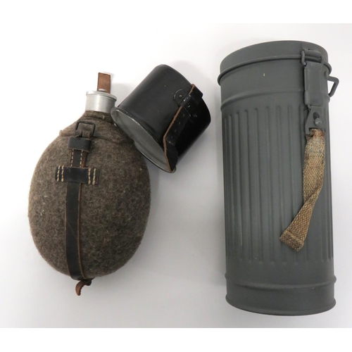 301 - WW2 German Respirator Tin And Waterbottle
grey painted, fluted steel, respirator transit tin.  ... 