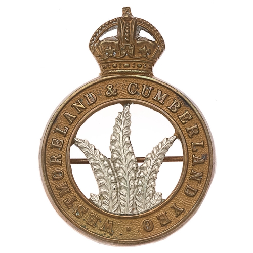 122 - Westmoreland & Cumberland Yeomanry NCO’s arm badge. Good scarce die-stamped brass crowned title ... 