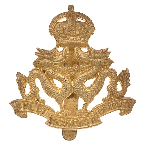 151 - Hong Kong Volunteer Defence Corps cap badge c. 1931-46.  Good scarce die-cast brass crowned pair of ... 