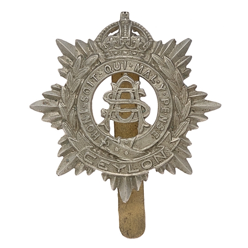 167 - Ceylon Army Service Corps cap badge c. 1918-48. Good scarce British made die-stamped white metal cro... 