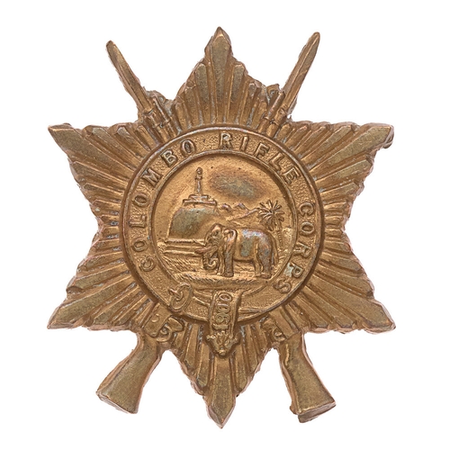 169 - Colombo Rifle Corps, Ceylon cap badge c. 1900. Good scarce British die-stamped brass example. Superi... 