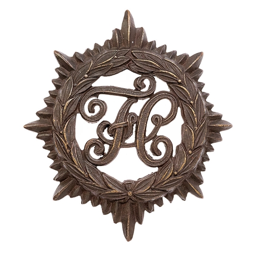 Women's Forage Corps WW1 cap badge c. 1917-19.  Good scarce die-stamped bronze eight pointed star; FC to voided centre.    .  VGC  Formed 1917 under Superintenent Mrs. Athole Stewart