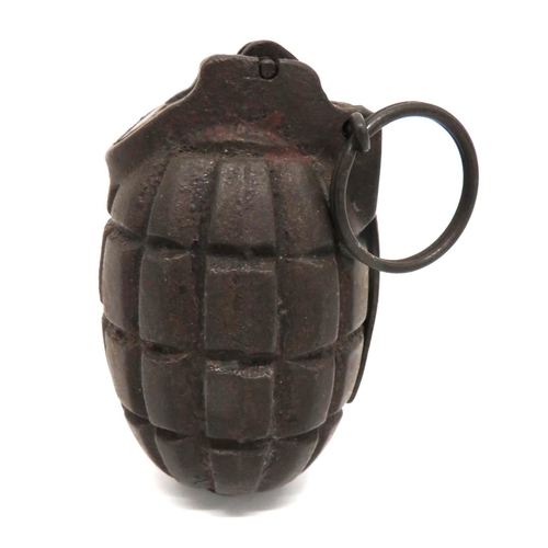 WW2 Inert No 23 Mills Grenade
cast iron fragmentation body.  Pressed steel lever.  Steel split pin and ring.  Lower steel base plug marked "Vono" "No 23 MKIII".  