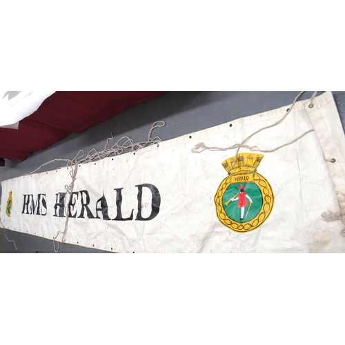 Post War Gangplank Banner For HMS Herald
long, rubberised linen banner with "HMS Herald" and both ends with the ship's crest. &nbsp;Edges with securing rings. &nbsp;Together with a small blue ensign for an Electrical Branch ... Blue and white signal flag. &nbsp;3 items.