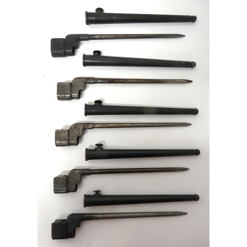 Five British WW2 No 4 MKII Spike Bayonets
spike blades. &nbsp;Blackened top sockets. &nbsp;Complete in their blackened steel scabbards. &nbsp;5 items.