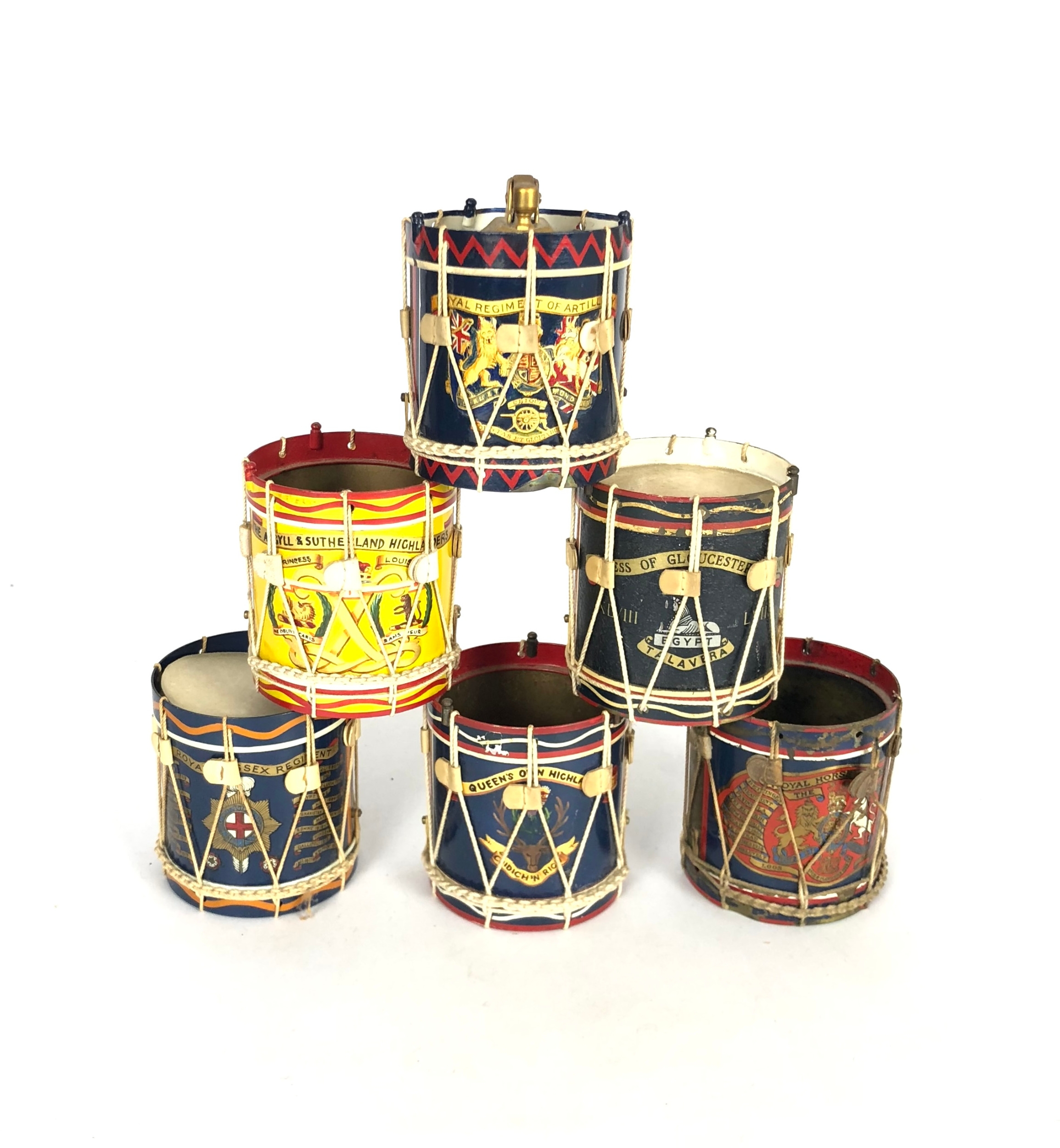 6 Miniature Regimental Drums. Each brass drum retains white tension ...