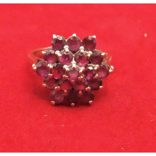 33 - 9ct yellow gold & ruby cluster ring, 3.7 grams gross

P & P – UK £10+VAT, EU £15+VAT, RoW £25+VAT.