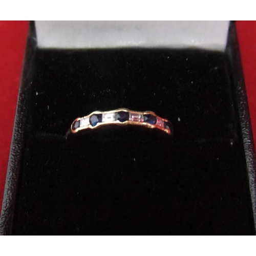 37 - 18ct Ladies diamond & sapphire half eternity gold ring, 2.4 grams

P & P – UK £10+VAT, EU £15+VAT, R... 