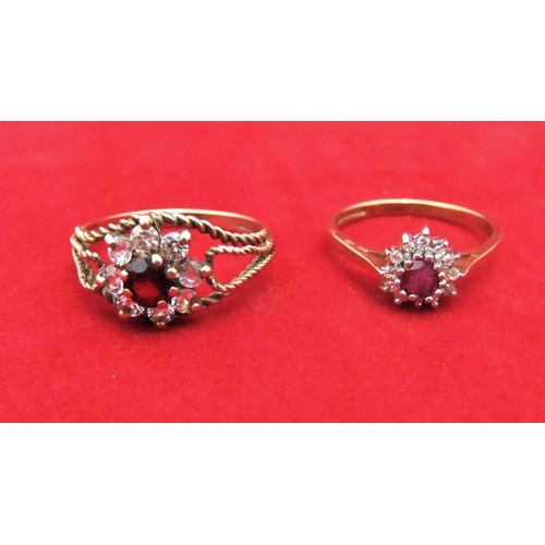 41 - 2, 9ct yellow gold  ladies ruby ring surrounded by diamonds, 4 grams total

P & P – UK £10+VAT, EU £... 