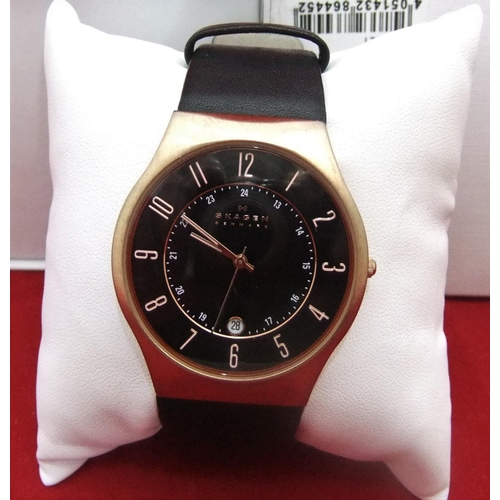 57 - Gents Skagen copper faced wrist-watch with black leather strap with box

P & P – UK £10+VAT, EU £15+... 