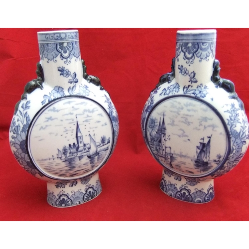 96 - Pair of 1906 Delft blue & white porcelain moon flasks, 26 cms in height