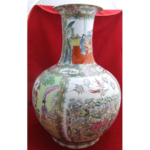 121 - Large Chinese 20thC famille rose flared bottle vase decorated throughout with birds, flowers & figur... 