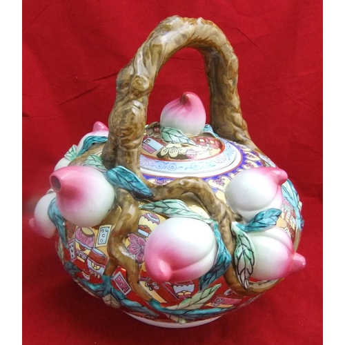 126 - Large ornate mid 20thC Chinese tea pot, unidentified marks, 30cms in height.

collection only