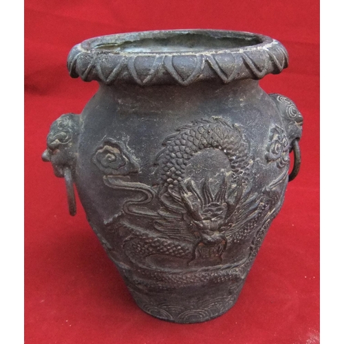 131 - Chinese antique bronze vase with ring handles, decorated throughout with dragon motif, 21cms height,... 