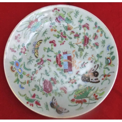 151 - Late Qing dynasty plate in polychrome decoration, of butterflies  in foliage, 26 cm in diameter