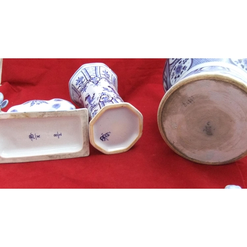 12 - 3 early 20thC Delft blue & white items including cow, faux Chinese jar with lid & larger oriental st... 