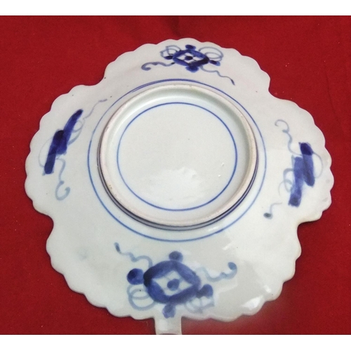 126 - 18thC Chinese plate decorated in iron red & blue, unmarked, approx 21 cms in width.