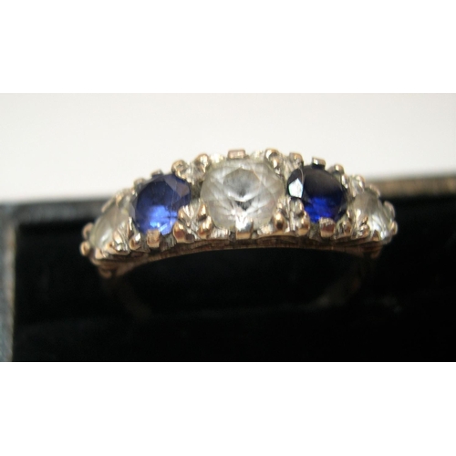 17 - 9ct yellow gold with 5 interspersed blue & white sapphires, 

3.1 grams,     size N