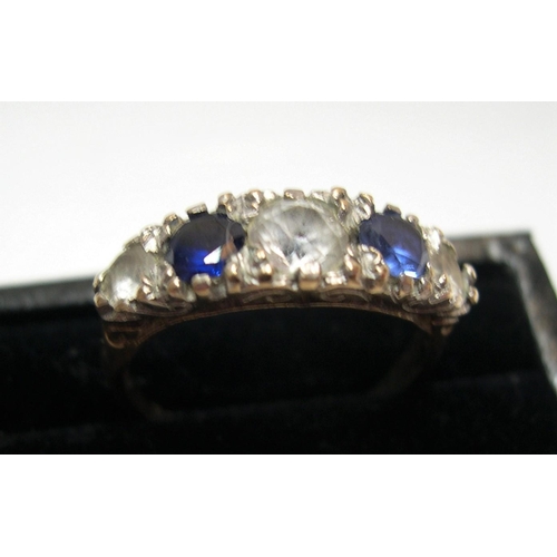 17 - 9ct yellow gold with 5 interspersed blue & white sapphires, 

3.1 grams,     size N