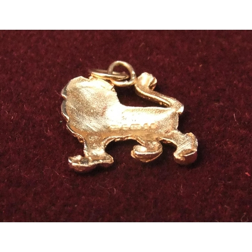 21 - 9ct gold Lion pendant