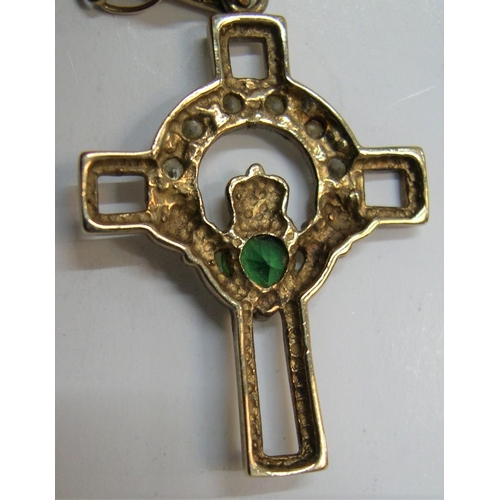 24 - 9ct gold claddagh cross with semi-prescious stones on a 16