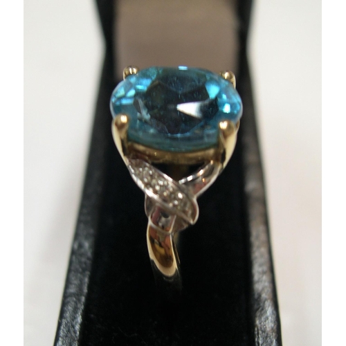 26 - 9ct gold ring set with large semi-prescious blue stone, probably Tourmaline

2.8 grams gross,    siz... 