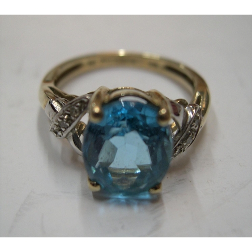 26 - 9ct gold ring set with large semi-prescious blue stone, probably Tourmaline

2.8 grams gross,    siz... 