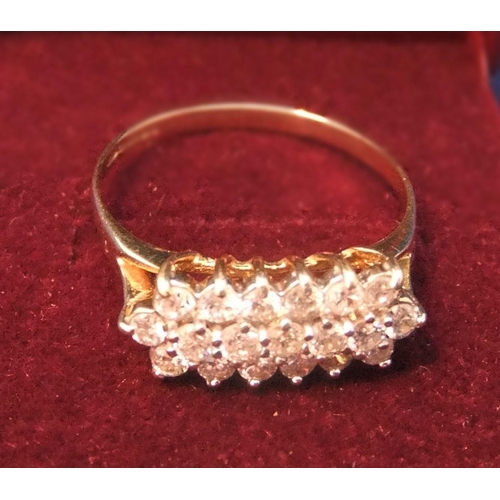 28 - 18ct gold ring with approx 1 ct of diamonds on 3 rows (13 diamonds in total).

size S/T,   2.7grams ... 