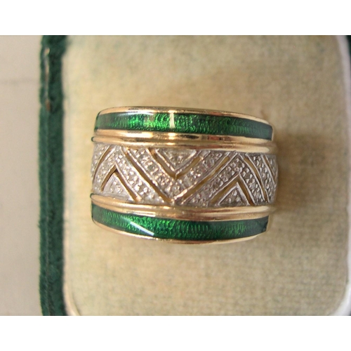 47 - stunning large 9ct gold ring encrusted in diamonds and green enamel

1.9 grams gross,    size P/Q