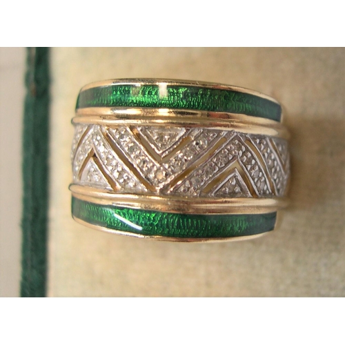 47 - stunning large 9ct gold ring encrusted in diamonds and green enamel

1.9 grams gross,    size P/Q