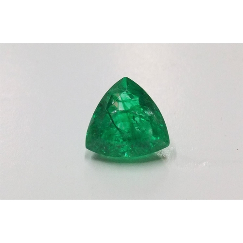 57 - GGL certified (CoA) NATURAL GREEN EMERALD, Trillion cut, 6.55ct