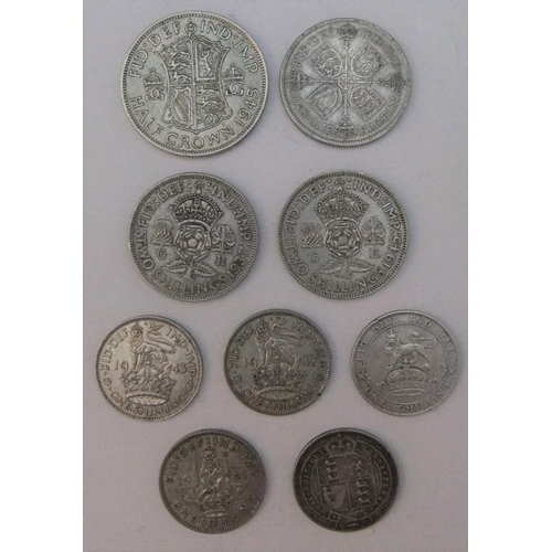 81 - 9 British coins - crowns, shillings & 2 shillings