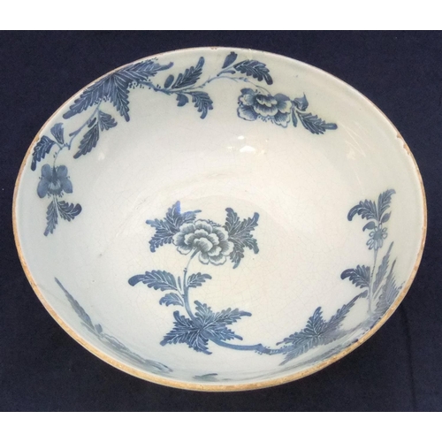 102 - 18thC Delft blue & white bowl with Chinese floral scenes

16cm in diameter, 10cm in height