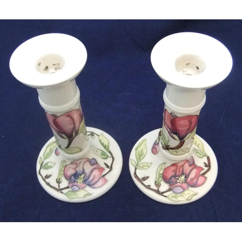 103 - Pair of Moorcroft candlesticks,

both 22cm high