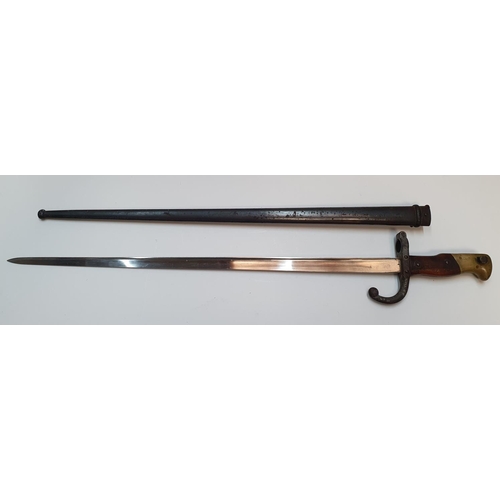 287 - Antique bayonet & original scabbard, both with matching serial numbers,

66 cm in length