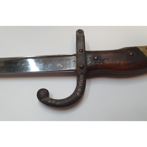 287 - Antique bayonet & original scabbard, both with matching serial numbers,

66 cm in length