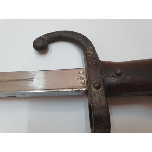 287 - Antique bayonet & original scabbard, both with matching serial numbers,

66 cm in length